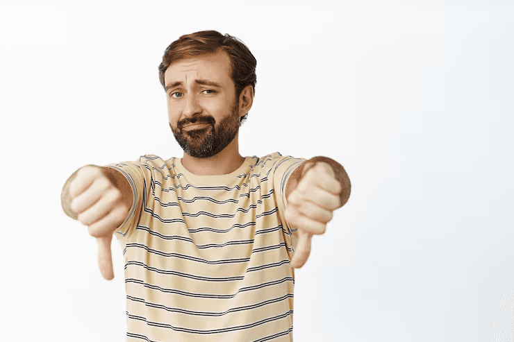 man doing thumbs down - How to Make Faceless YouTube Videos