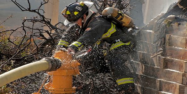 West Metro firefighters attacking a vehicle fire