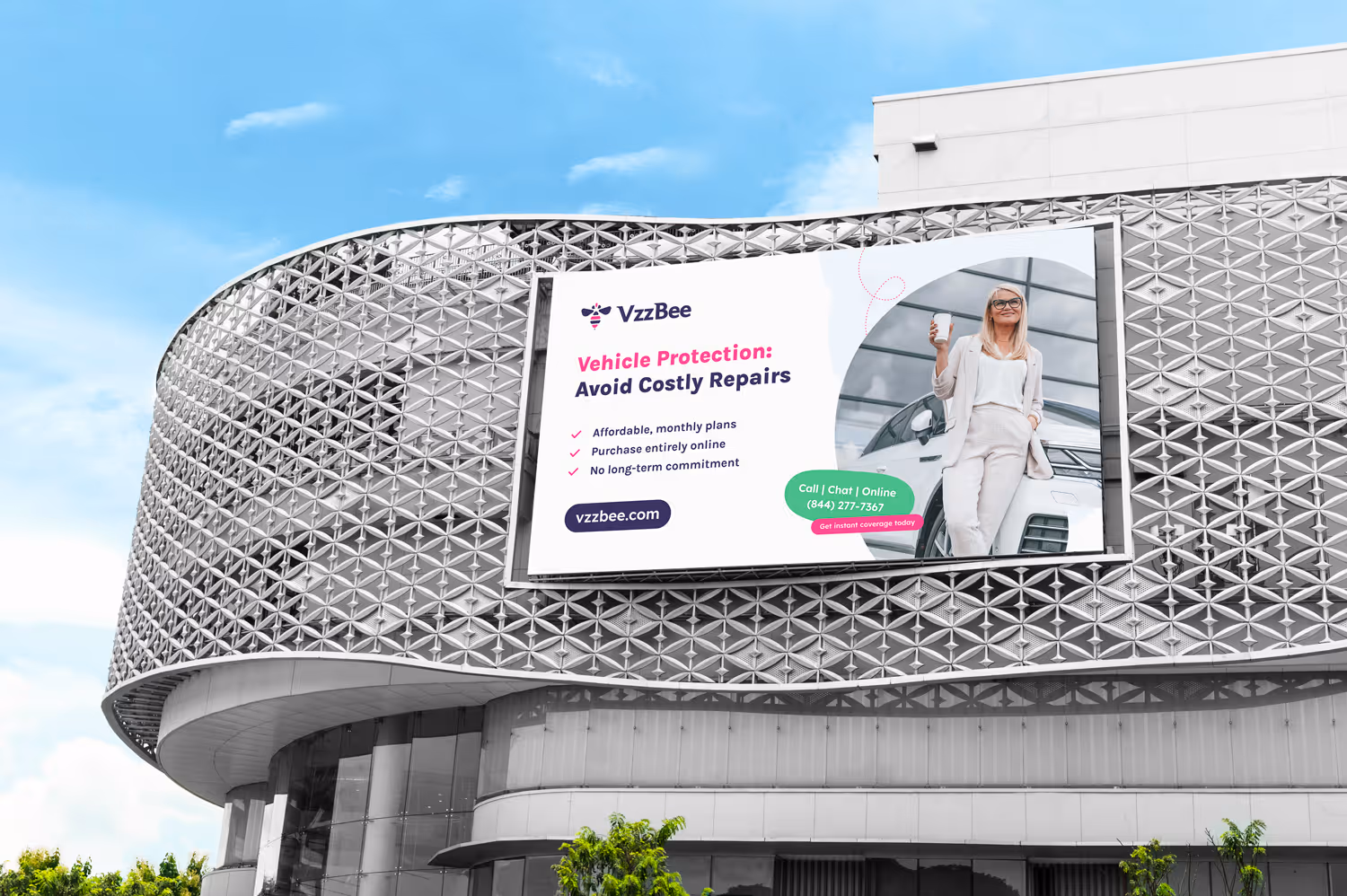 Billboard featuring advertisement on a modern building, promoting vehicle protection services with a smiling woman holding a coffee cup. Highlights affordable, online plans and customer service contact information.