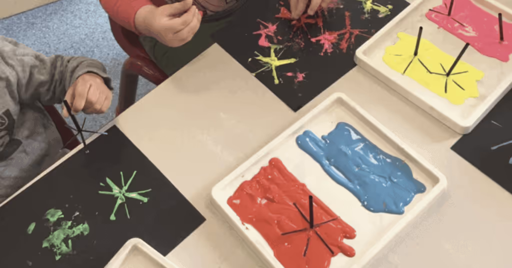 children painting Holi fireworks artwork