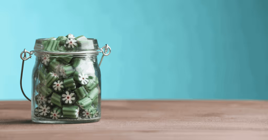 green sweets in a jar