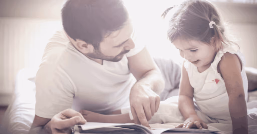 Man reading book with child