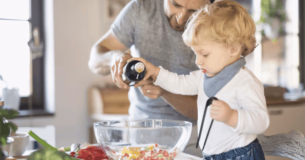 parent and toddler cooking