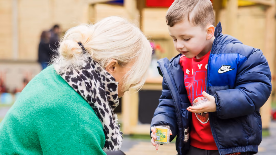 Early Years Art Specialist With Child.