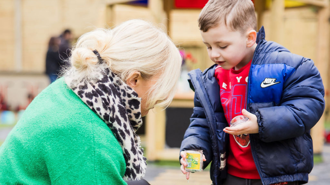 Early Years Art Specialist With Child.