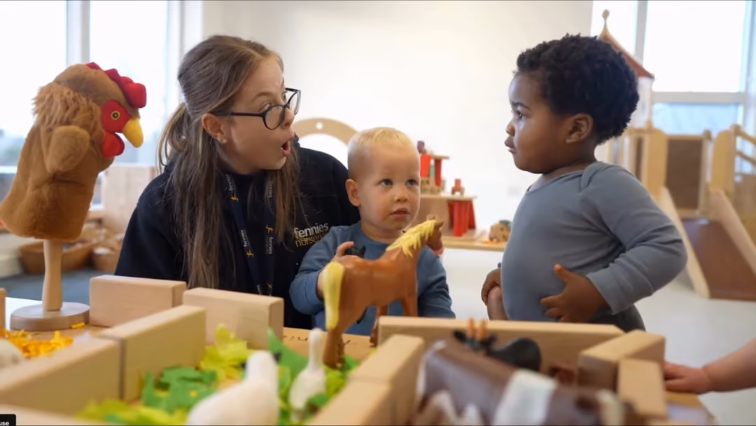Early Years Educator With Children