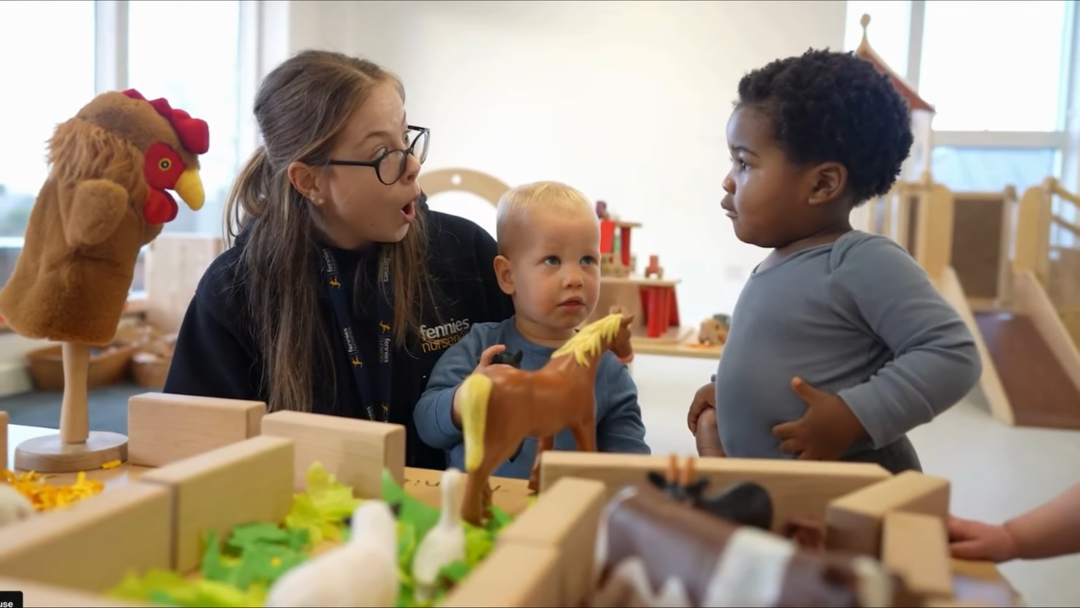 Early Years Educator With Children