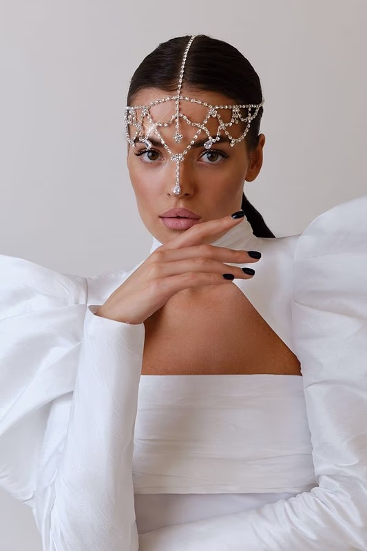 Тика с кристаллами LN