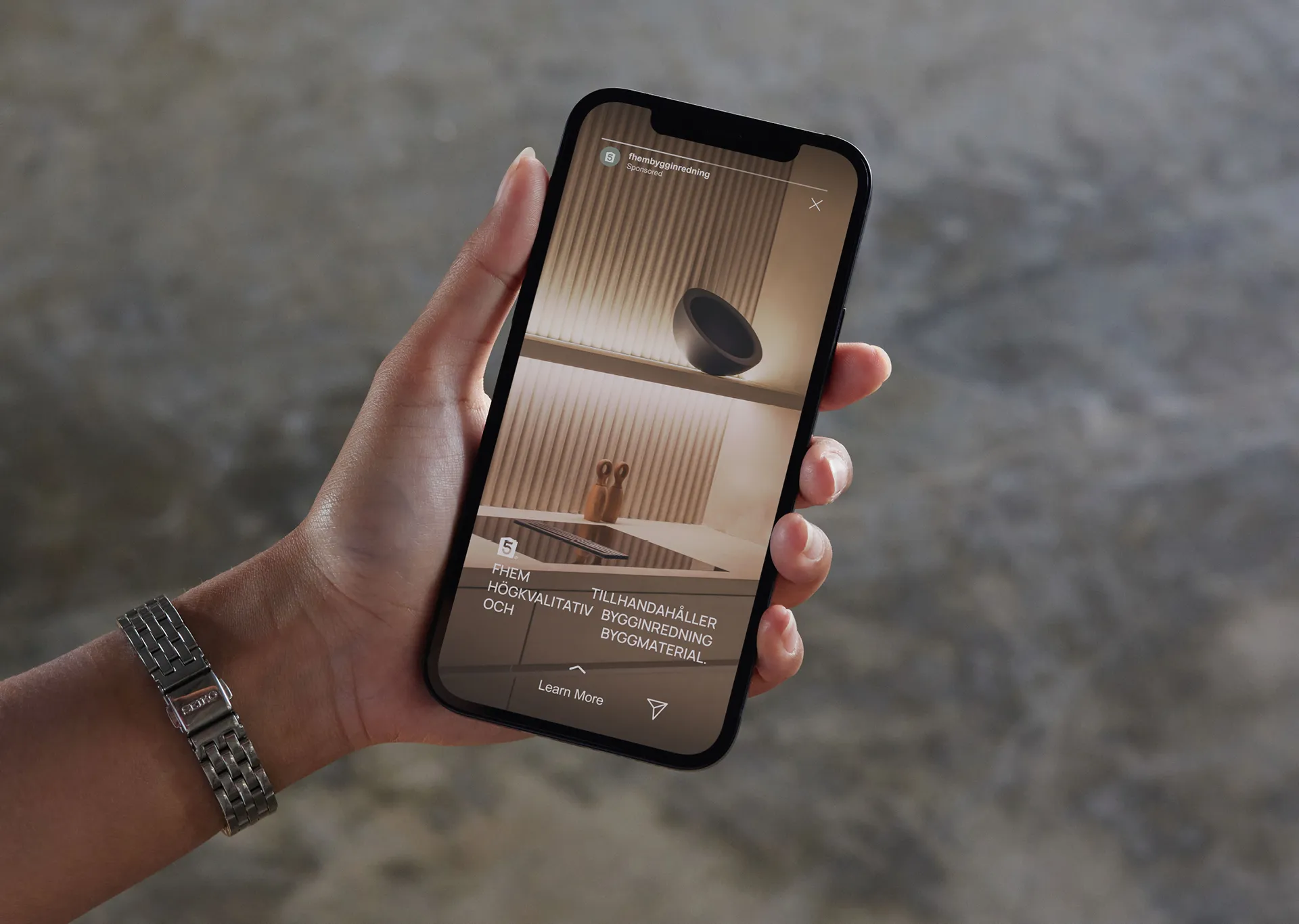 A person using an iPad, visiting a modern and minimalistic website for AU—RA. Green, lush images paired with modern text that describes the company and its services.