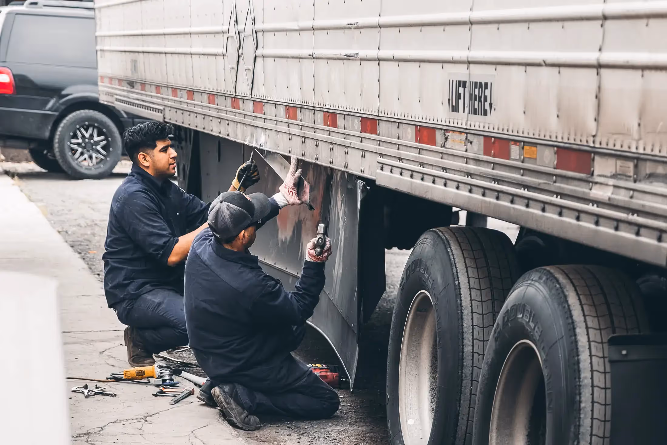 Mobile Diesel mechanic performing collision repair services in Milwaukee, CA