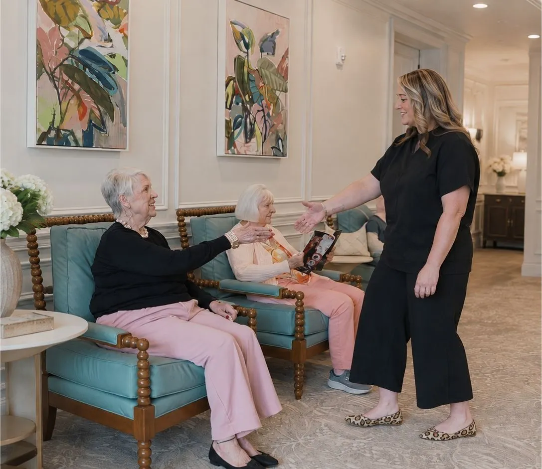 A provider meets a resident in the Wellness Lobby at Symphony Park Senior Living.