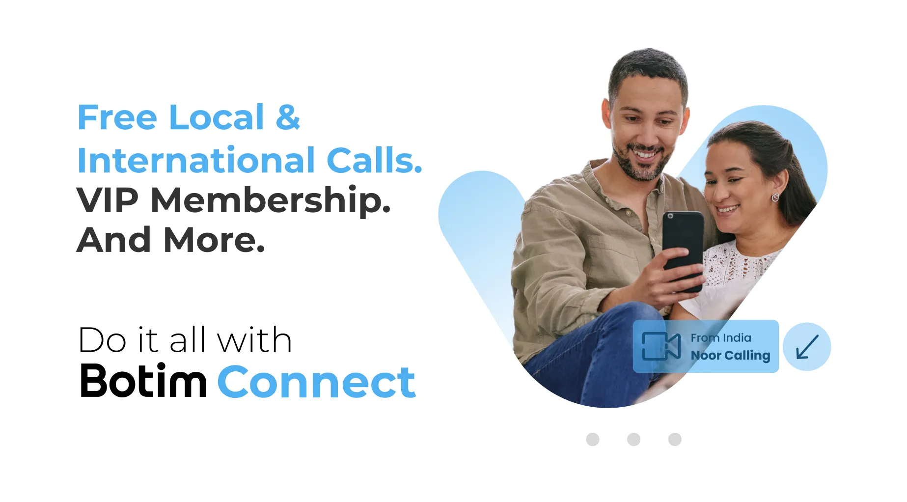 a man and woman looking at a cell phone