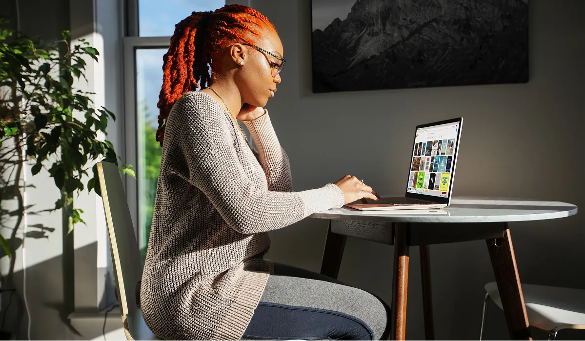 a woman working with her laptop