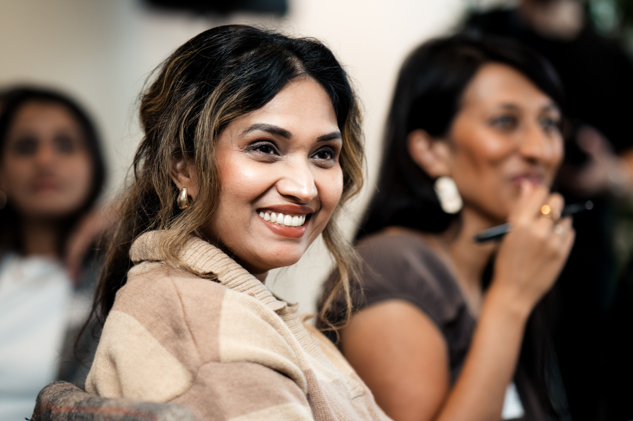Happy looking women at a conference