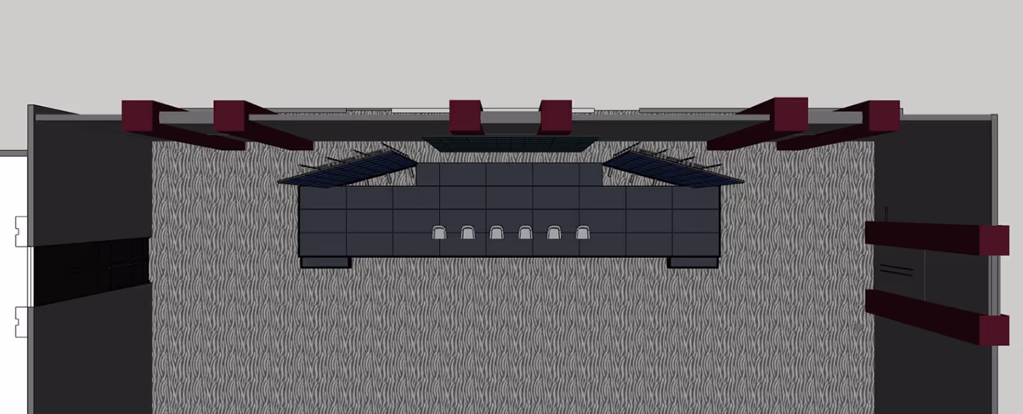 Вид сверху на конференц-зал с шести стульями за длинным столом и декоративными панелями на стенах.