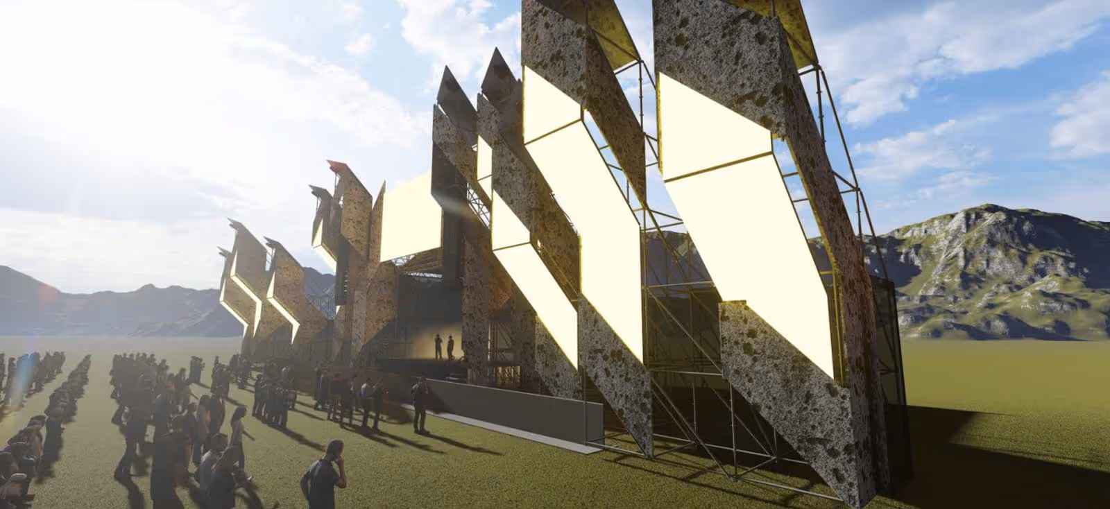 Аудиенция на открытом воздухе перед большим современным сценическим сооружением с яркими световыми панелями и горами на заднем плане.