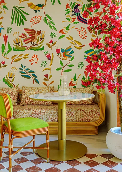 Colourful interior dining area with floral decor at Frou Frou Marbella