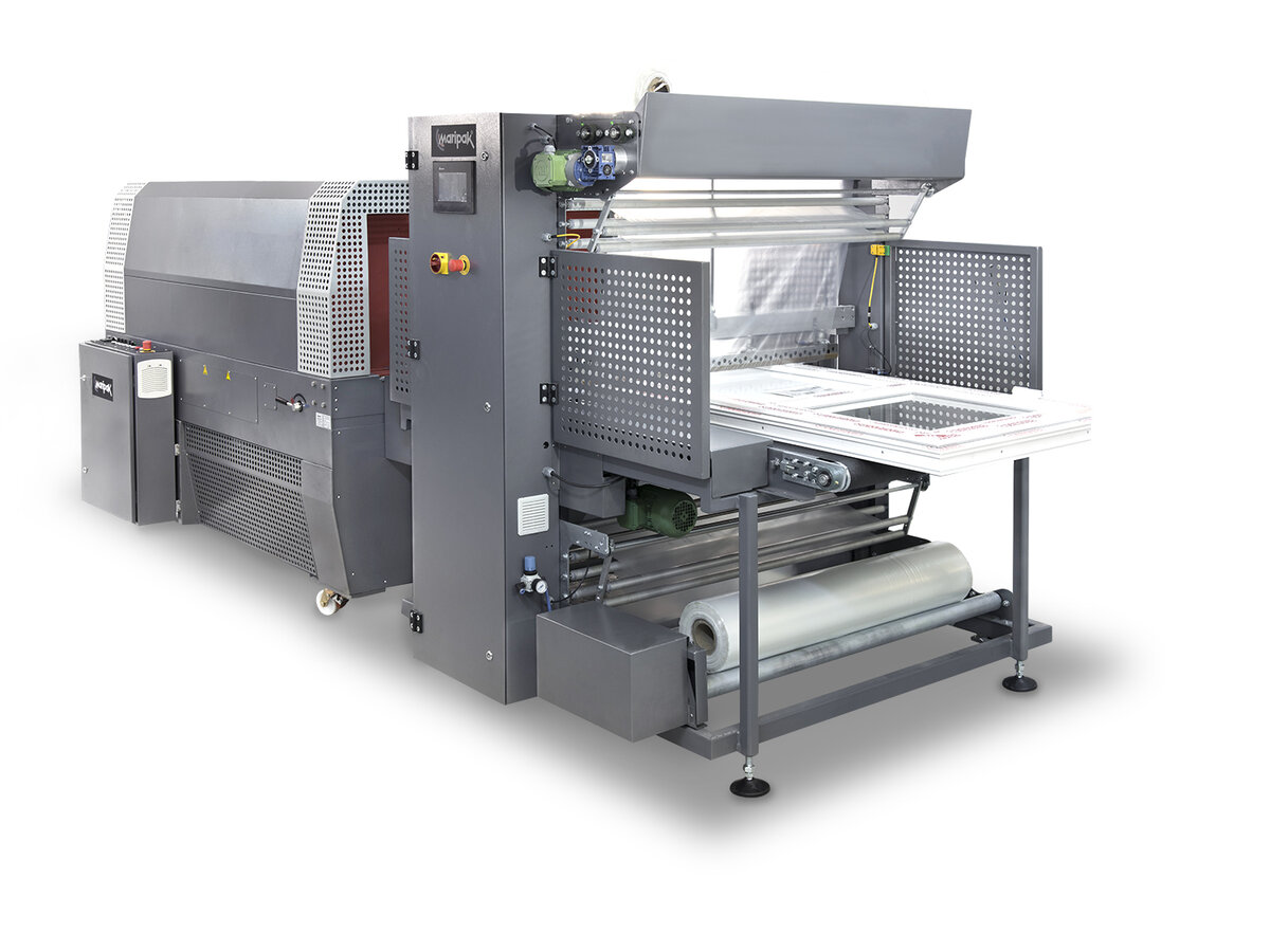 Complete sleeve wrapping machine and heat tunnel packaging line