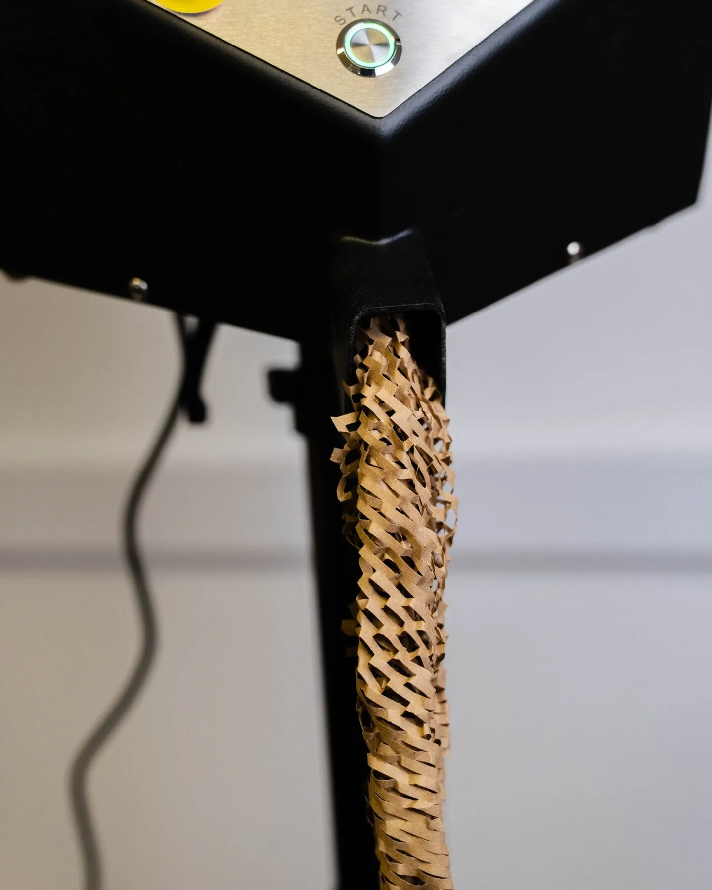 Expanded honeycomb paper cushioning dispensing from the Auto HexaFil machine