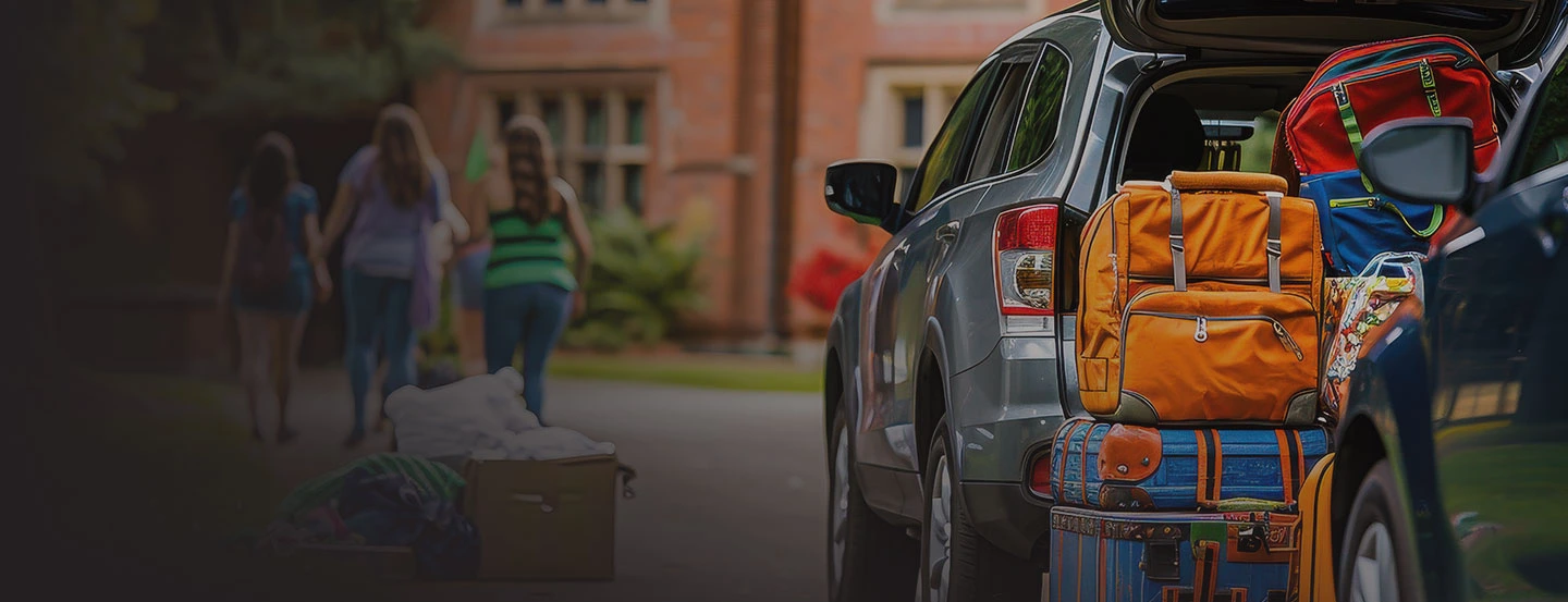 car being unloaded on college move-in day