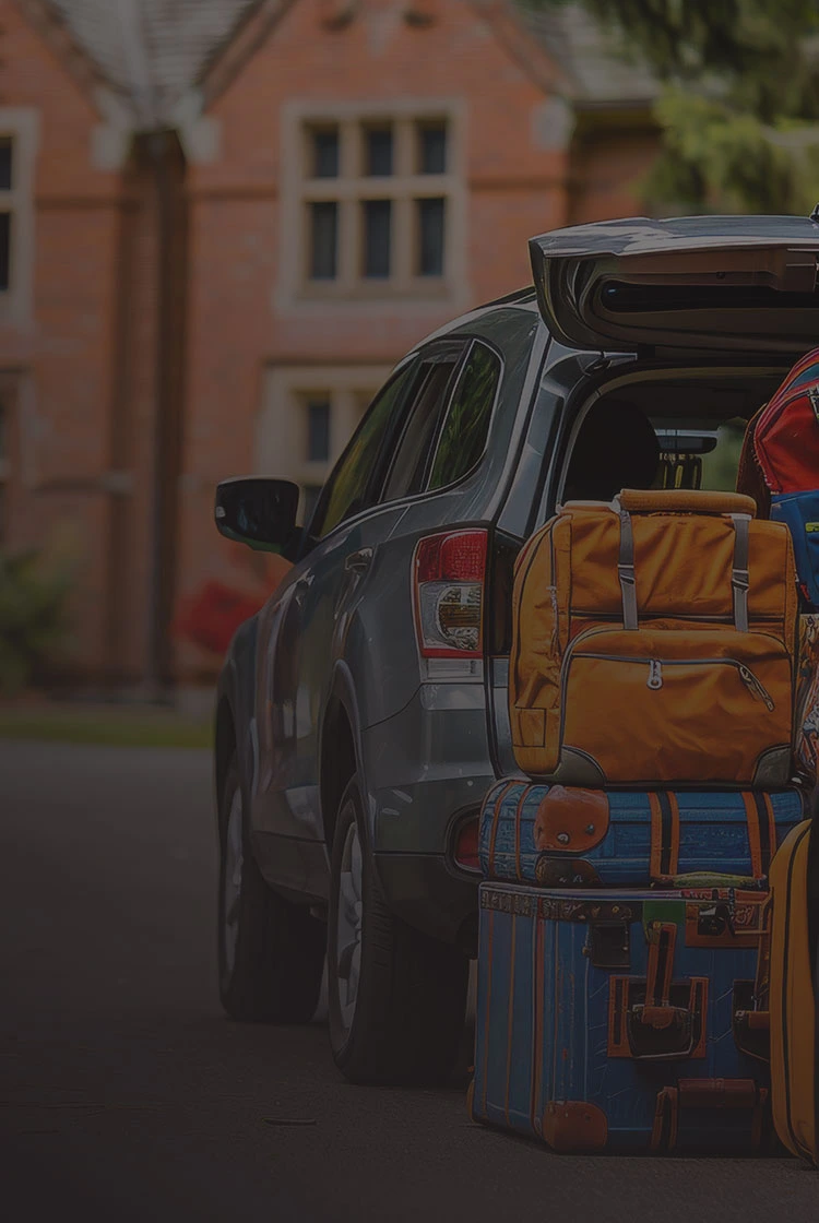 car being unloaded on college move-in day