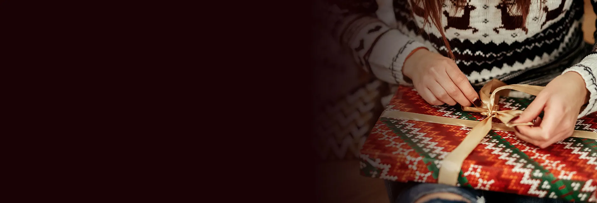 woman unwrapping present