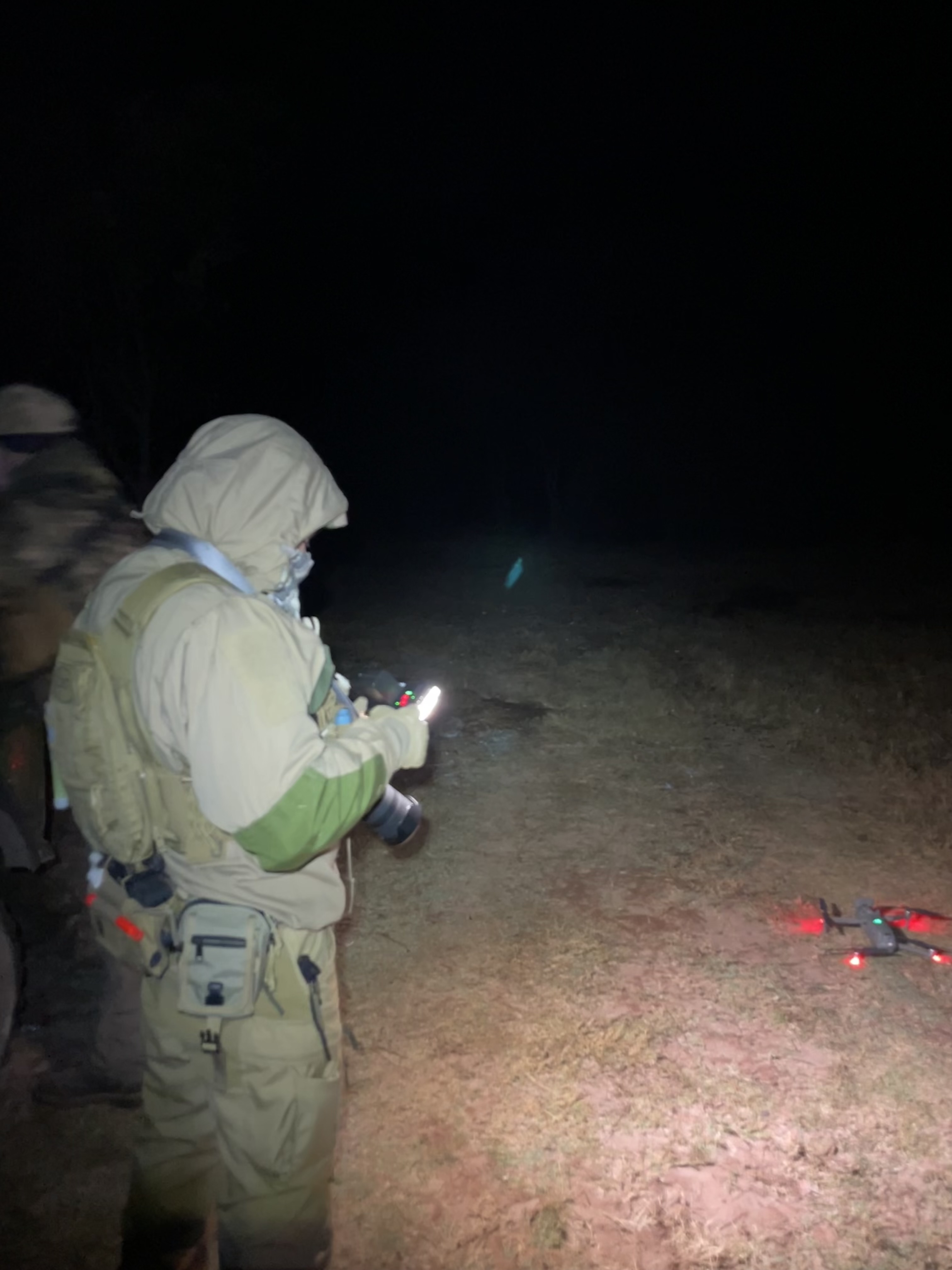 Flying a drone with a thermal sensor over the reserve at night, to possibly pin point where the leopards on the reserve are.