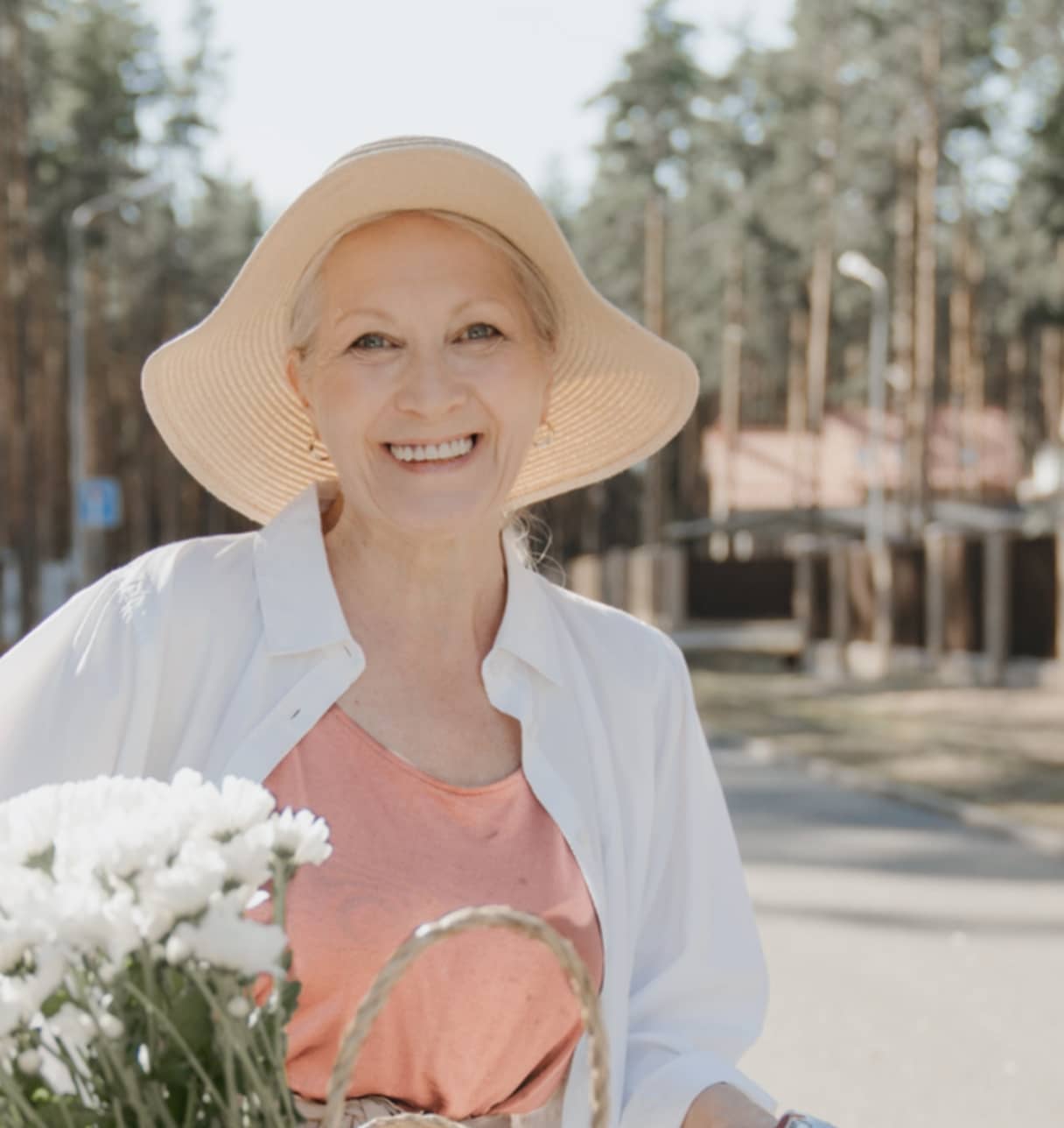 Best Elder Care For Your Loved Ones Woman Senior Carring Flowers - ElderlyCare X Webflow Template