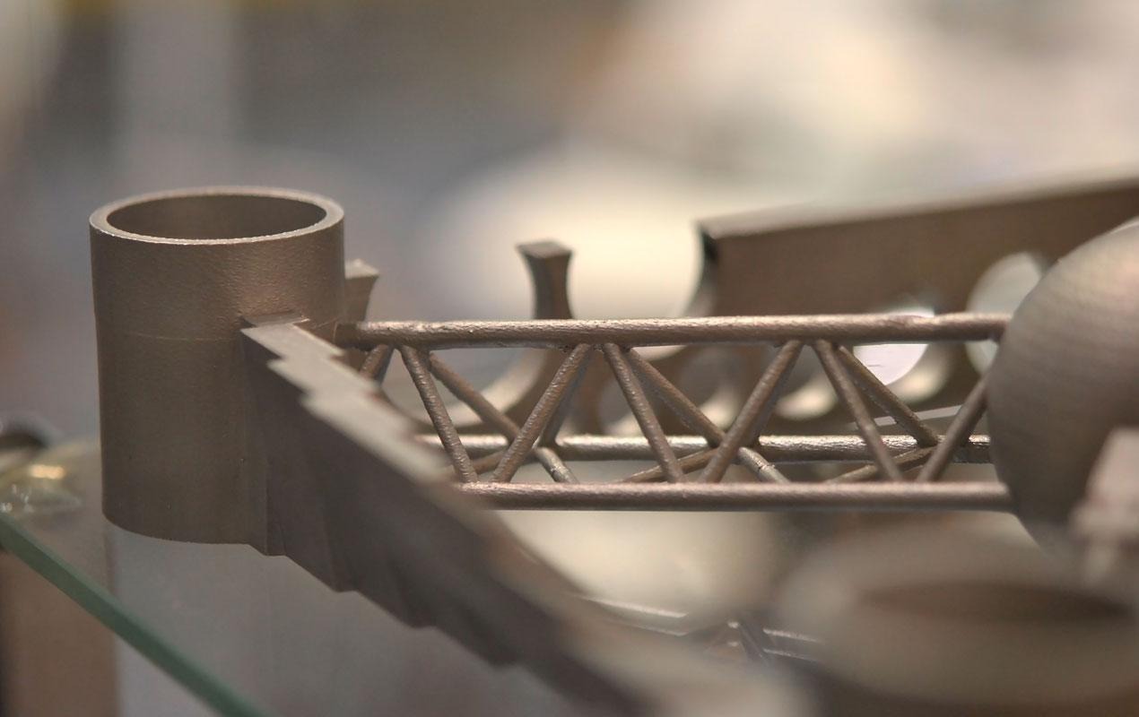 Componente fabricado mediante sinterización selectiva por láser