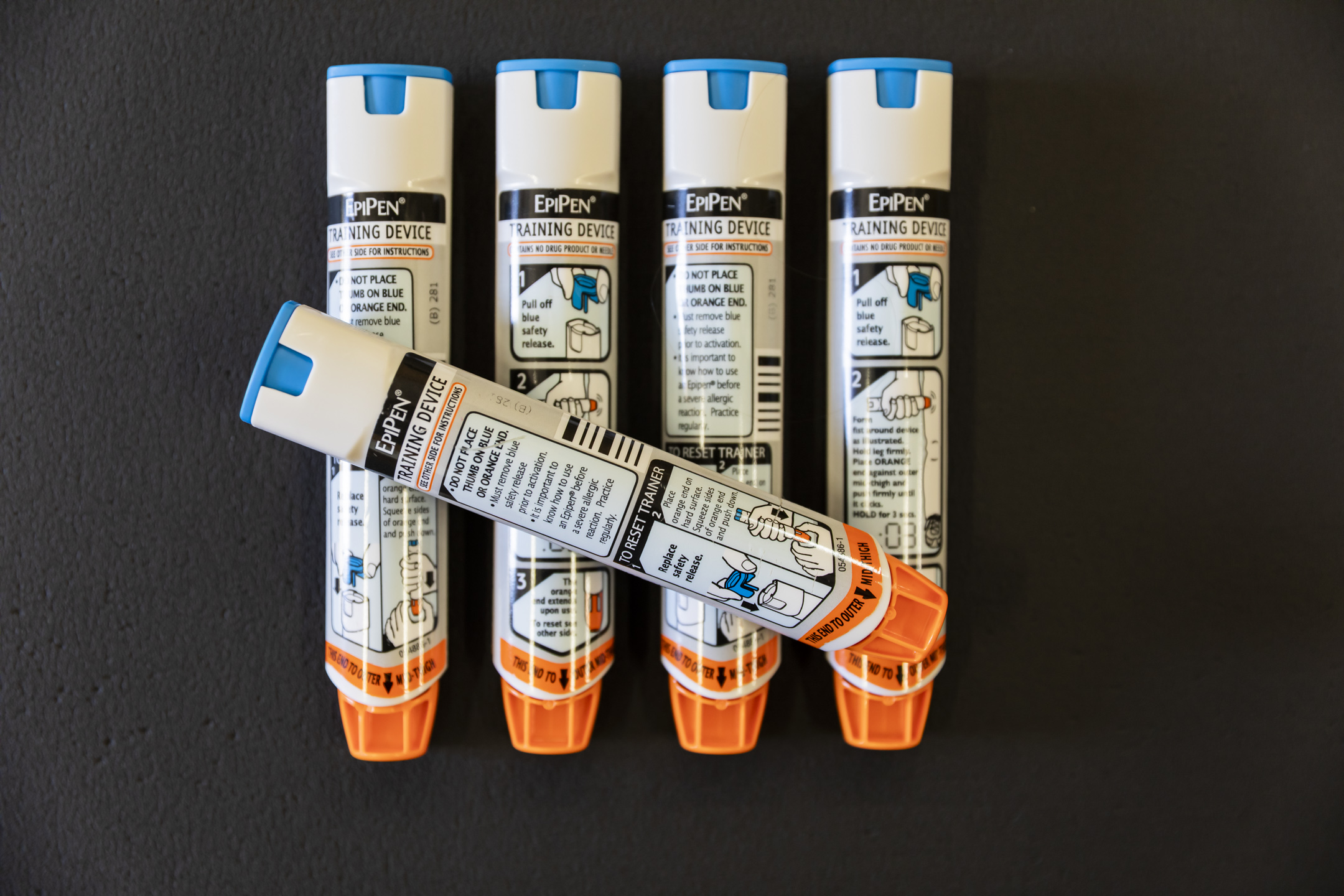 EpiPen adrenaline autoinjector trainer devices used during first aid courses at ETA Training Perth