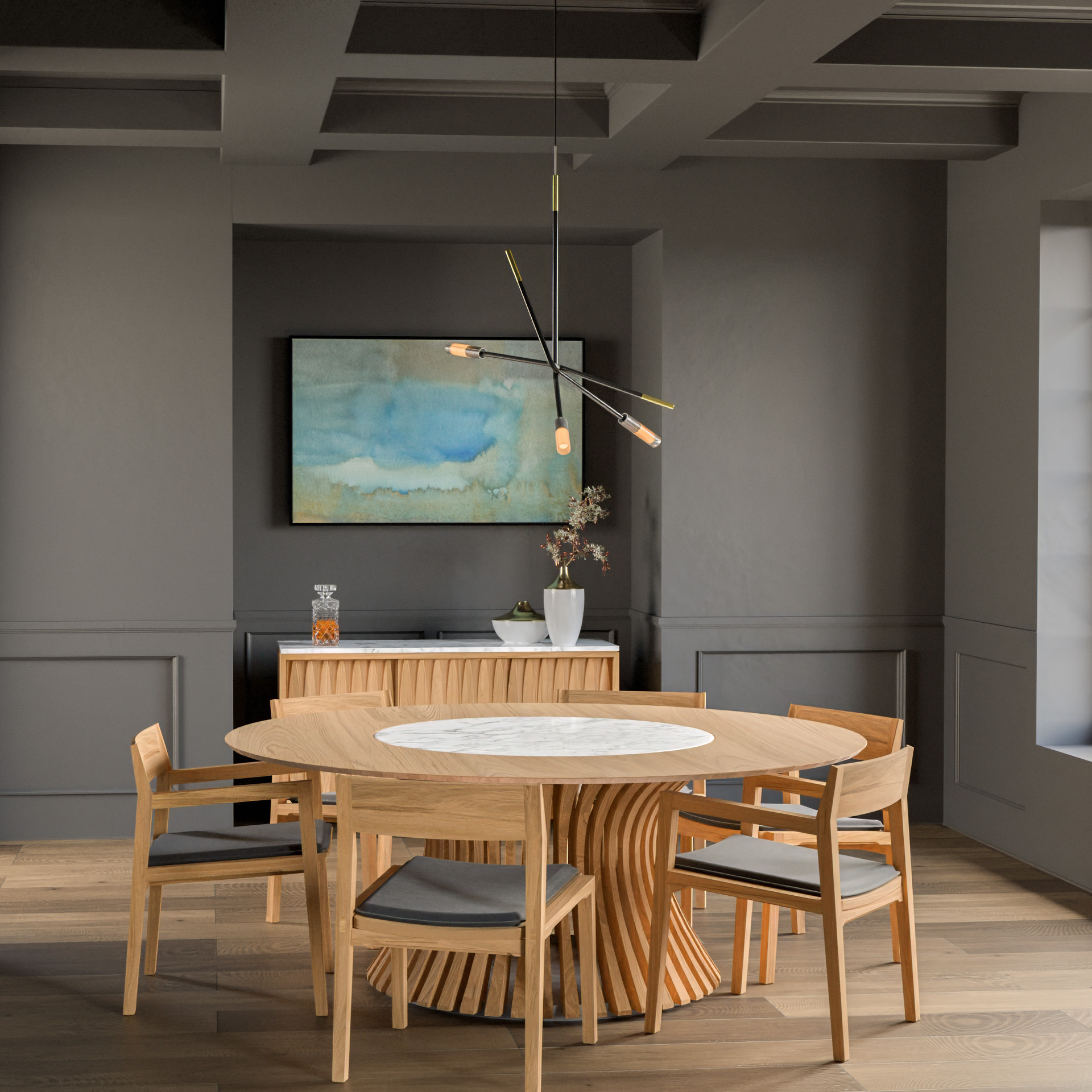 Limn Ragusa collection round table and chairs in a paneled dining room