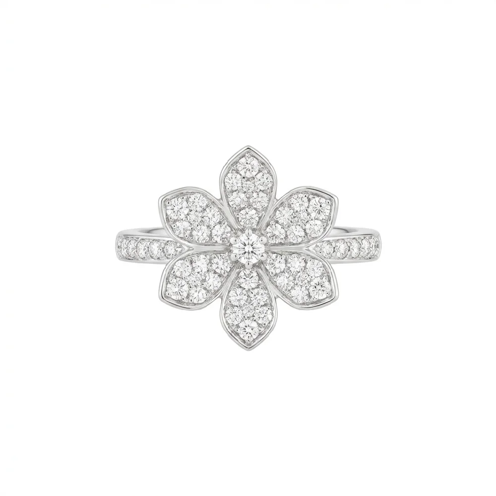 Close-up van een Van Cleef & Arpels Frivole ring met diamanten en geelgoud.