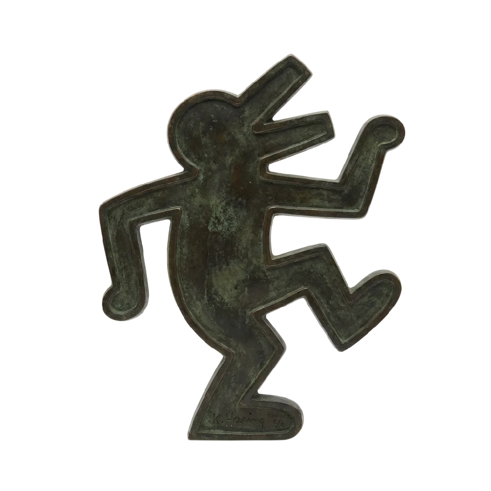 Close-up van een Keith Haring Bronzen Sculptuur met de kenmerkende tekenstijl