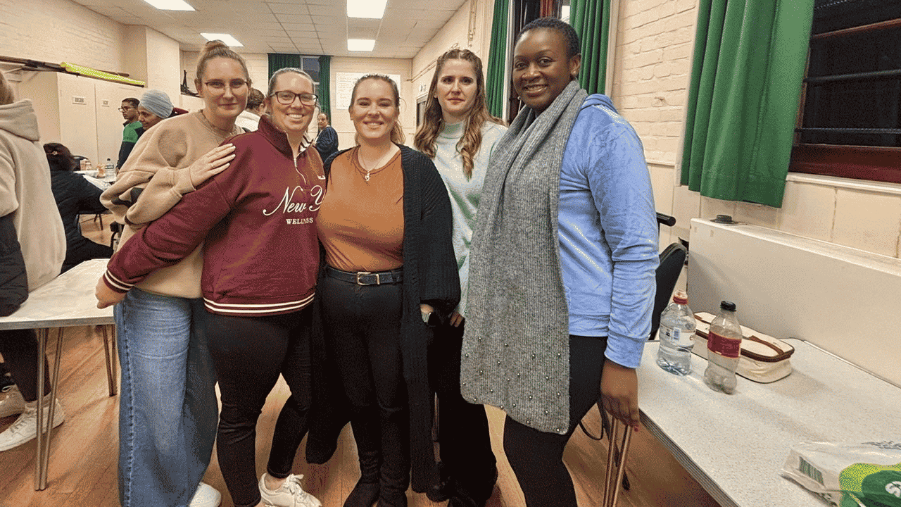 Five Care & Carers team members smiling together after completing the Level 2 Oliver McGowan Mandatory Training.