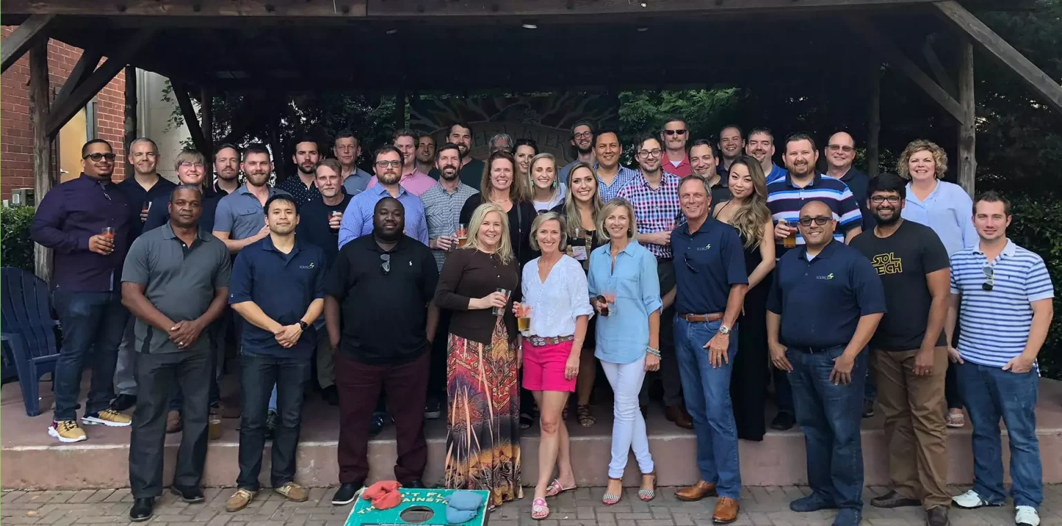 Members of SOLTECH team pose together during company outing