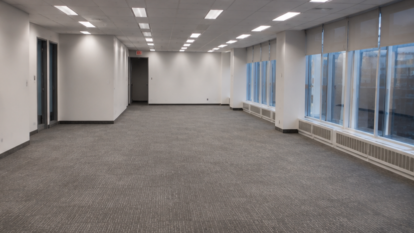Emptied Toronto office floor after a full furniture decommissioning