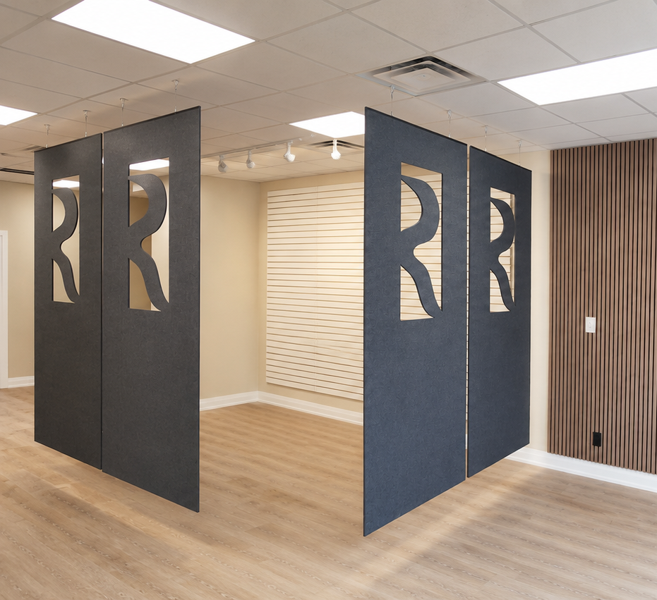 Freestanding acoustic partition panels dividing an open Toronto office space