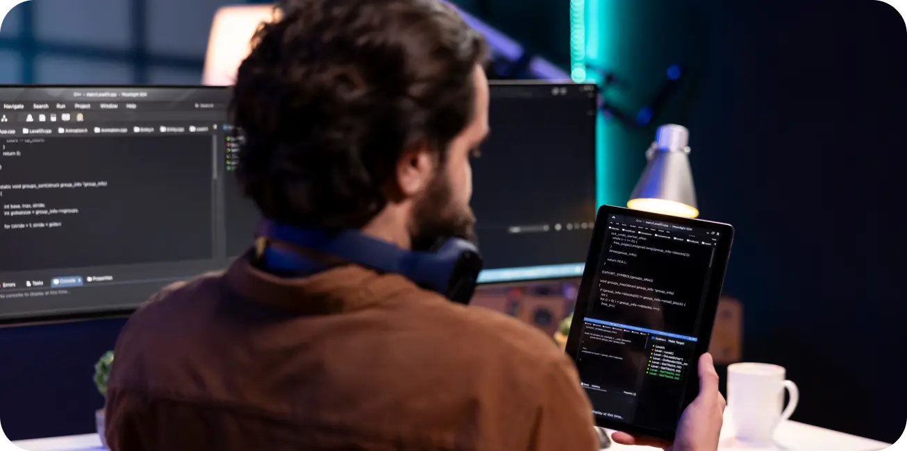 LeadX web developer building a responsive Shopify website on a laptop