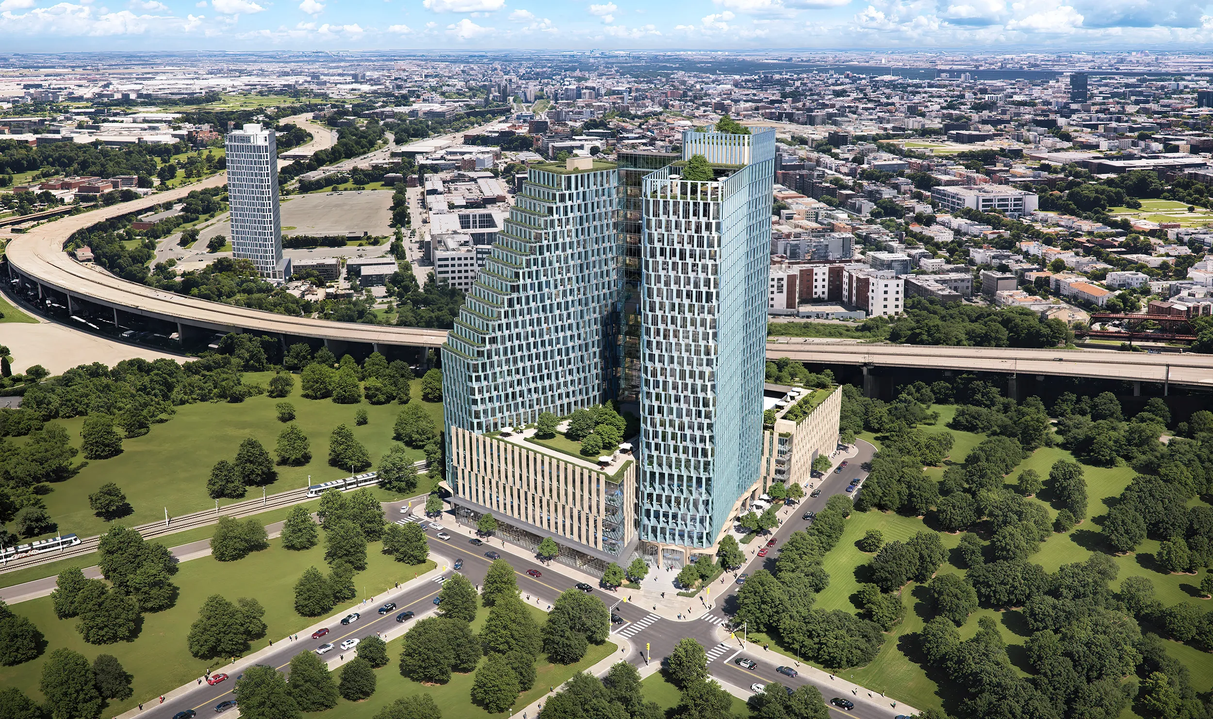 Illustrating tower presence as part of a larger civic and environmental system.
