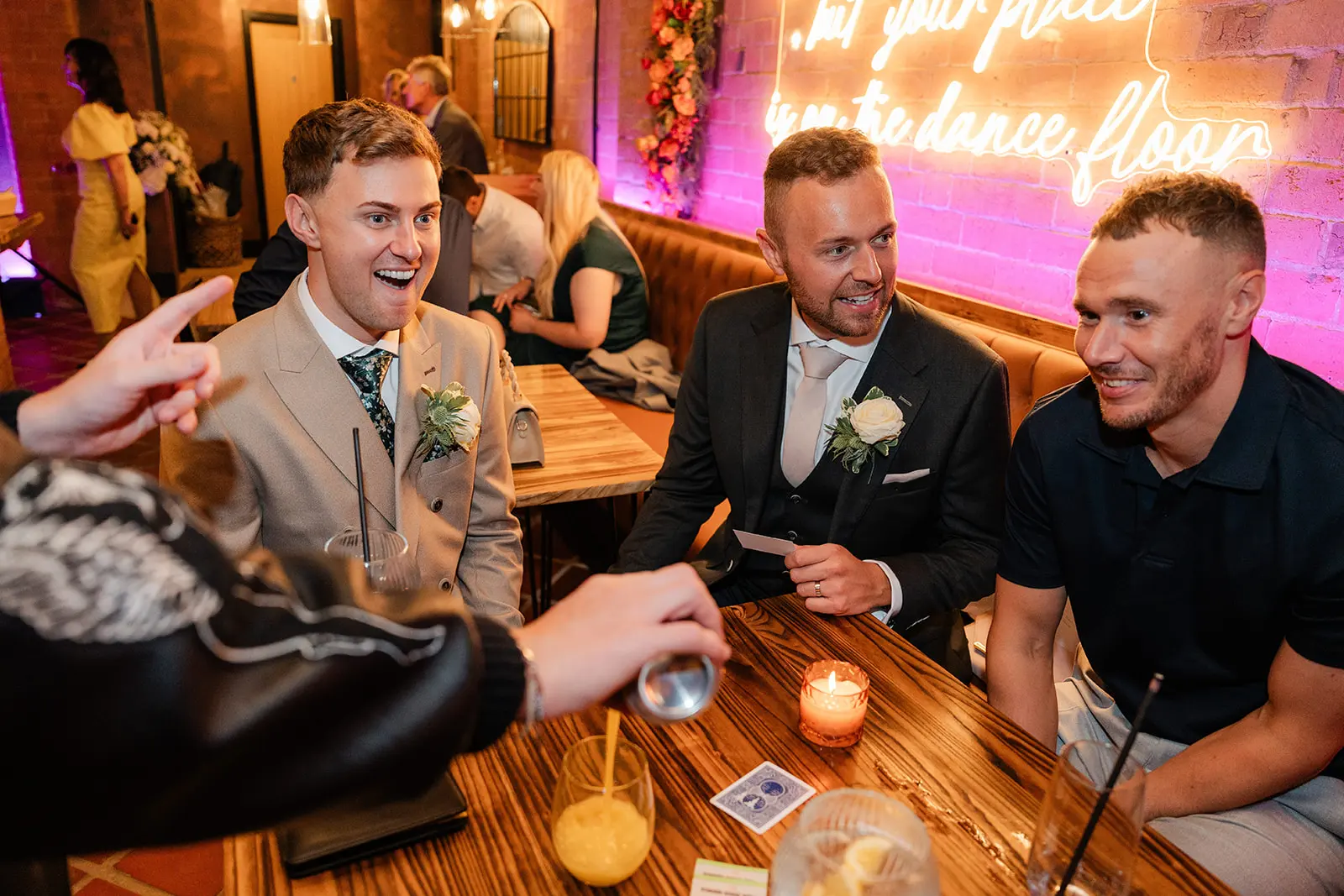 Guests enjoying drinks in a booth at the Gallery Bar at Blackbrook Barns, Lichfield, Staffordshire