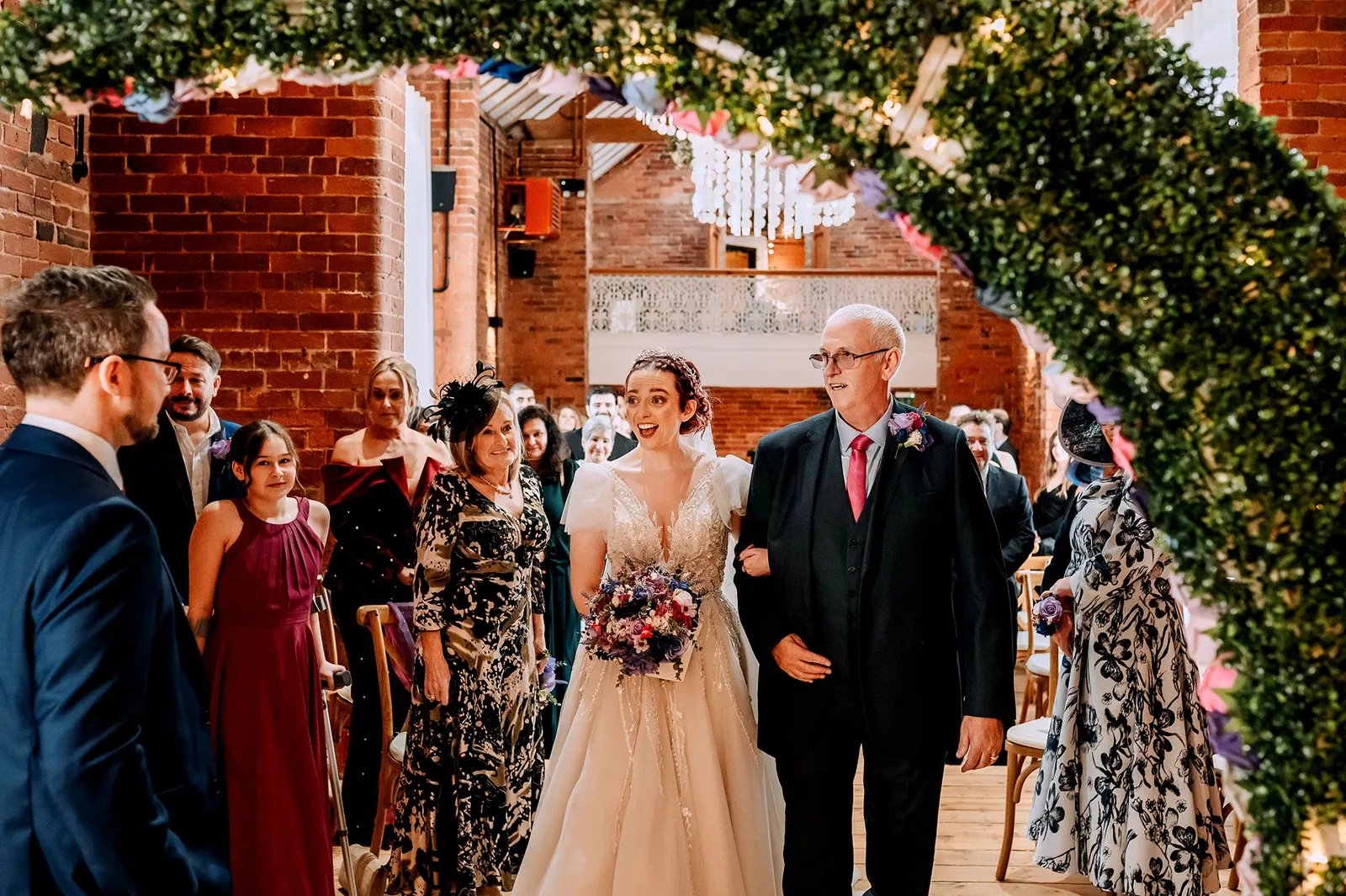Bride walking down the aisle with her father at Blackbrook Barns, Lichfield, Staffordshire