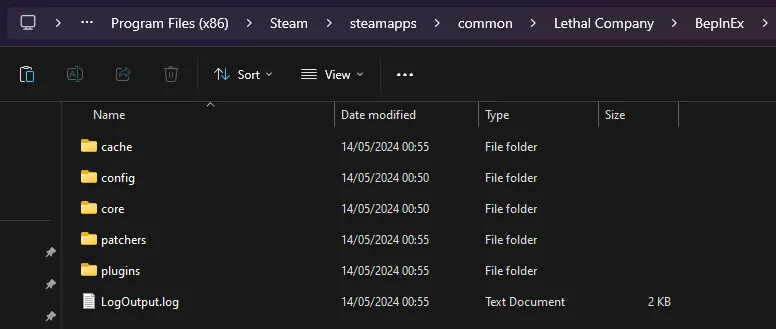 Screenshot of the BepInEx folder inside the 'Lethal Company' directory on a Windows computer, showing various subfolders and a file organized for mod management. The folders include 'cache', 'config', 'core', 'patchers', and 'plugins', all modified on 14/05/2024. There is also a 'LogOutput.log' file, providing details on the operations and changes made by the mods. This layout demonstrates the structured approach to organizing mod-related files within the game's directory.