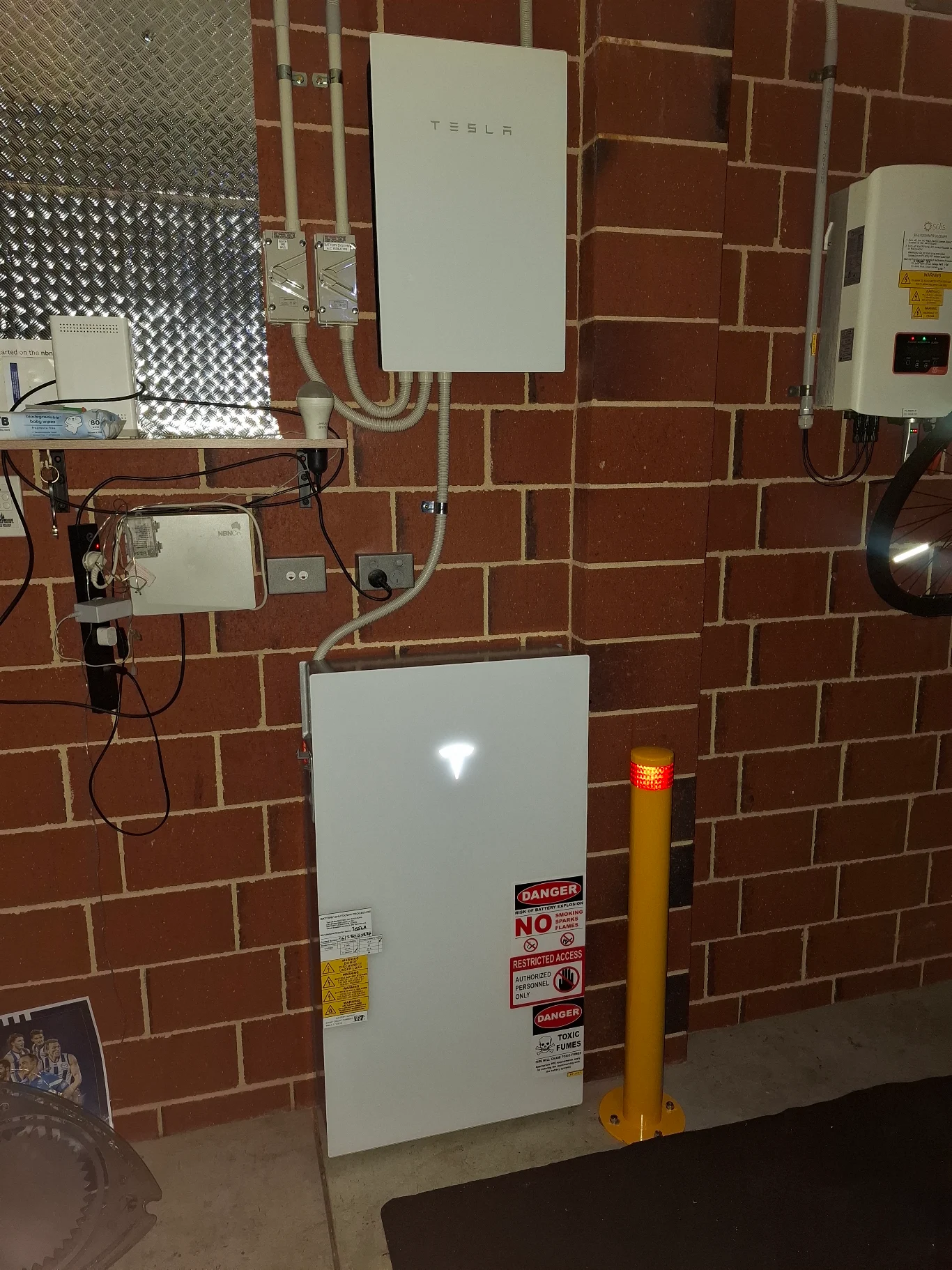 Tesla Powerwall 3 installed inside a residential garage