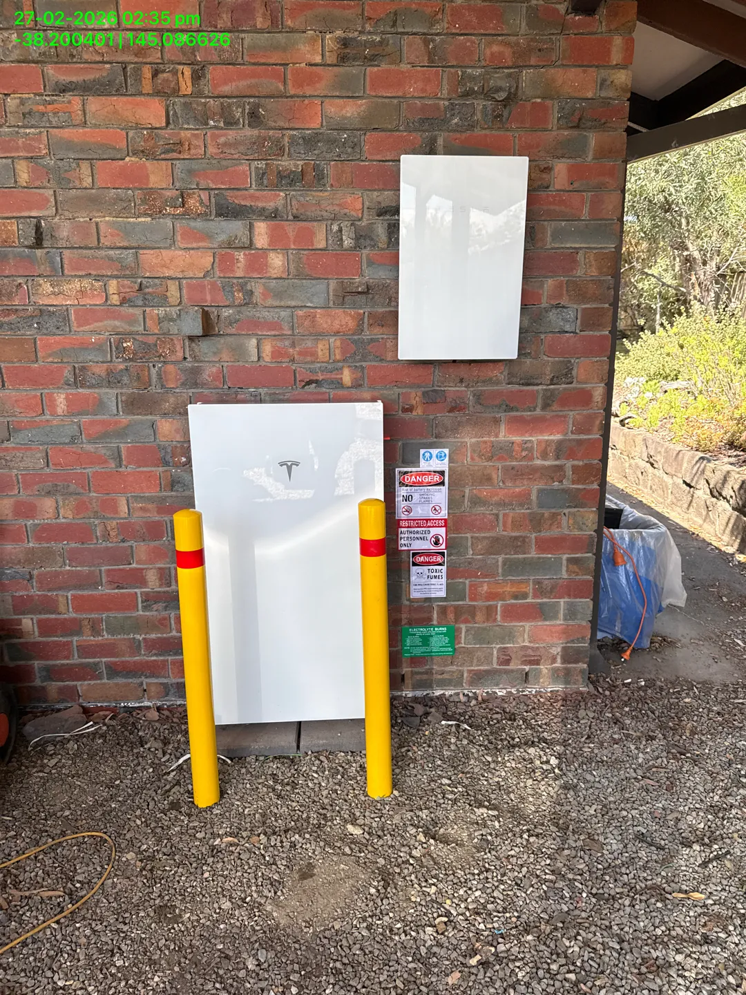 Tesla Powerwall 3 installation outside a residential home