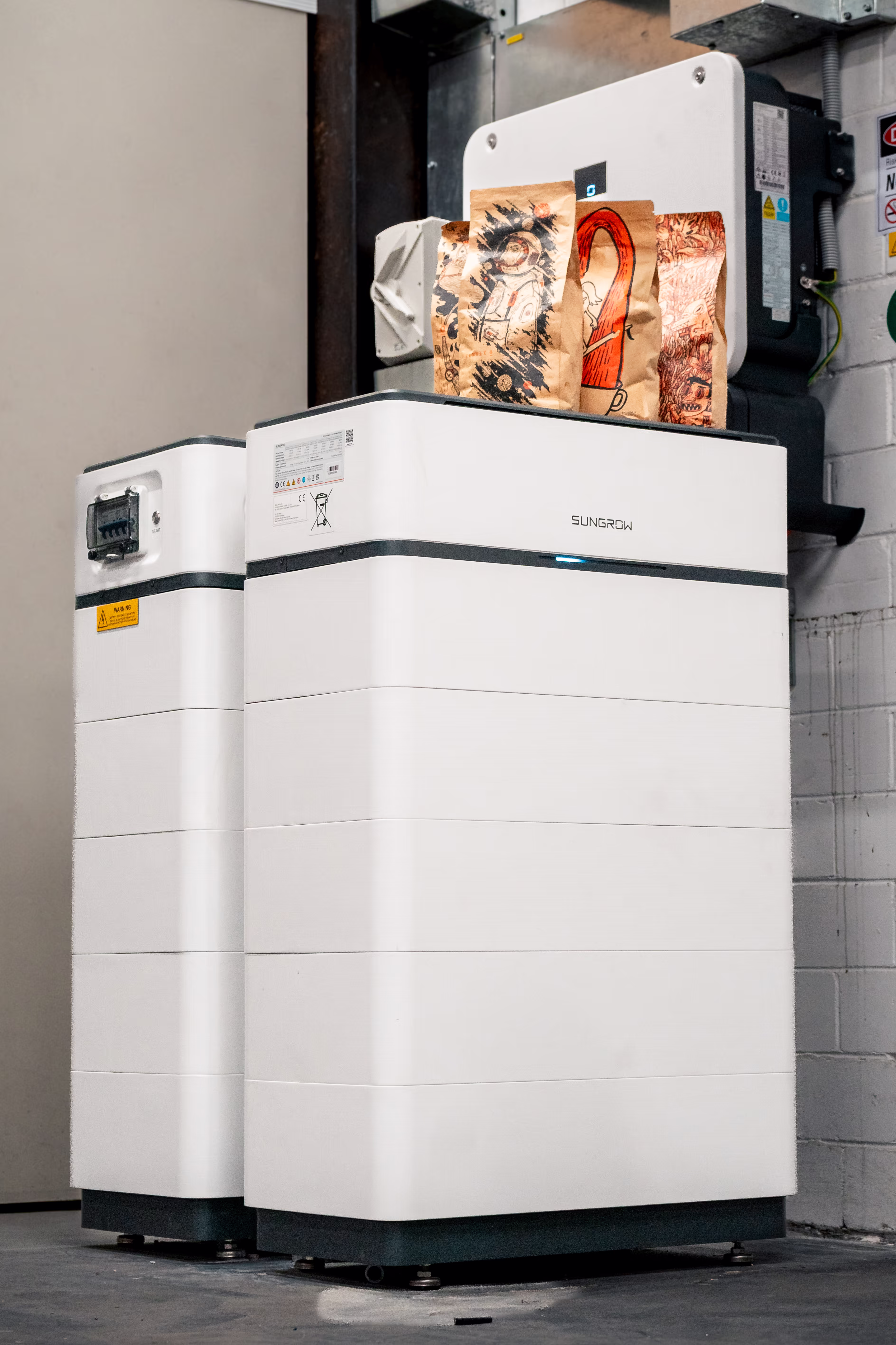 Sungrow SBH battery installation at Single O coffee with coffee bags displayed