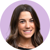 Smiling woman with long brown hair and light makeup against a purple circular background.