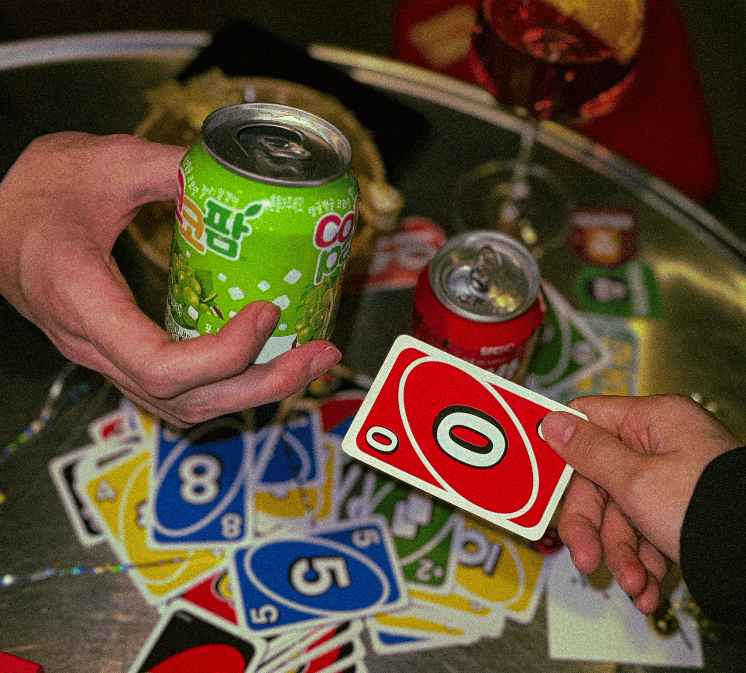 UNO cards and korean soft drinks at Kkokki Loes Vegan, a korean vegan restaurant / bar in Hamburg Sternschanze