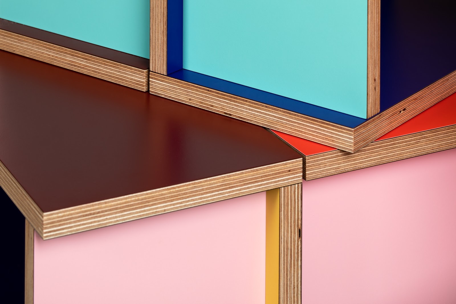 Close-up of the Combination Table’s precision-cut birch plywood edges and bold laminate colours, showing Uncommon Projects’ craftsmanship and attention to material detail.