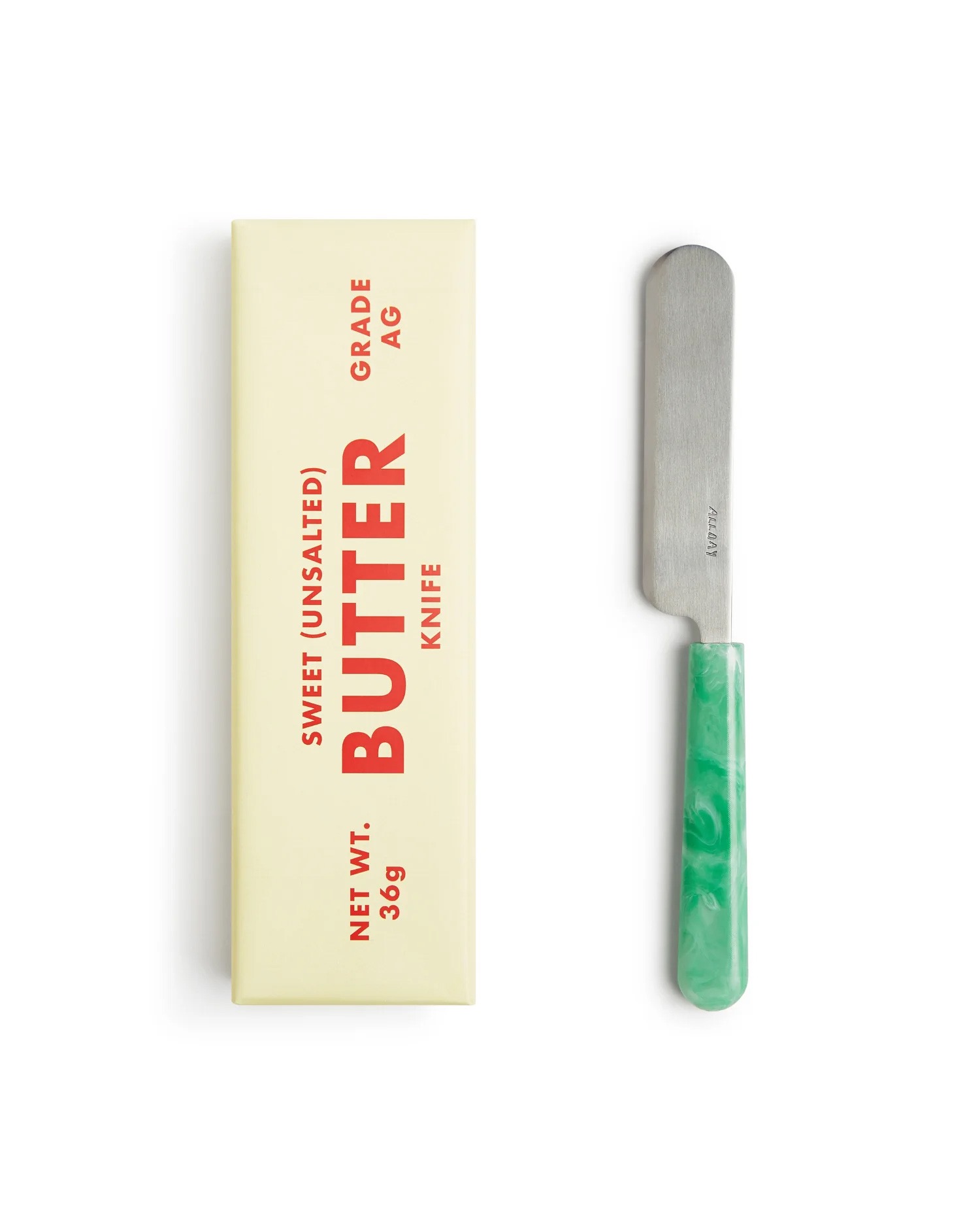 Recycled-plastic-handled butter knife by Allday Goods shown with its cream and red packaging.