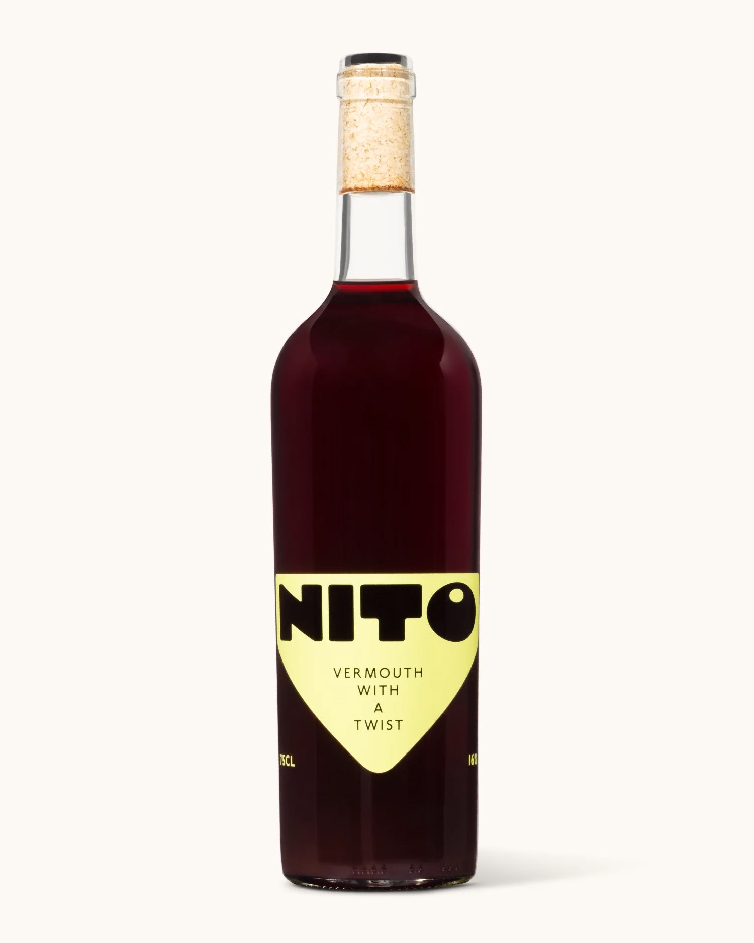 Bottle of Nito vermouth with cream label reading ‘Vermouth with a Twist’ on a light background.